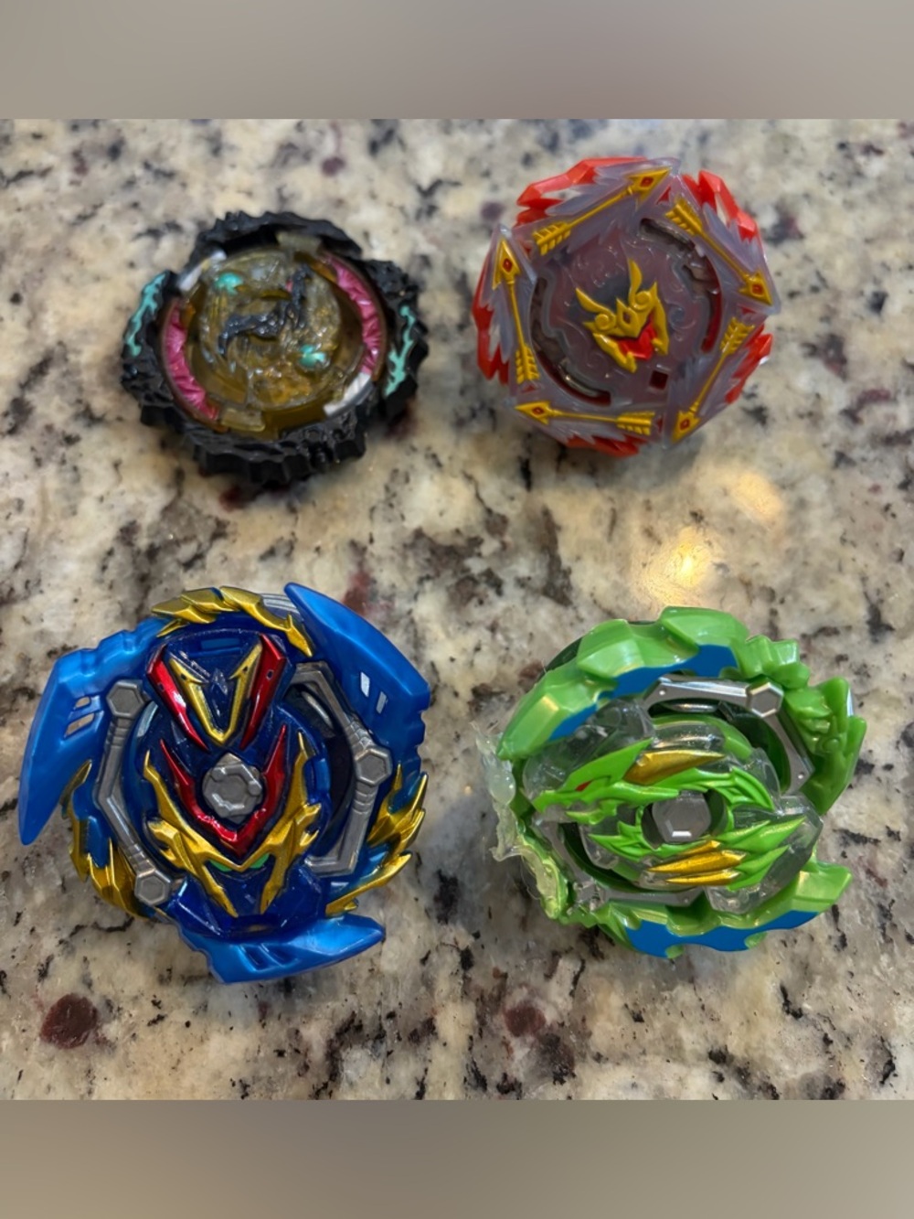 Four-Piece Beyblade Spinning Battle Tops Lot